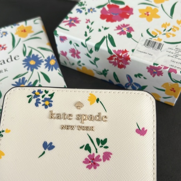 Kate Spade zip around wallet, crème multi brand new with tags and original box - Picture 9 of 10